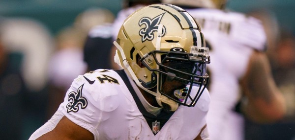 Mark Ingram runs with the ball while playing for New Orleans